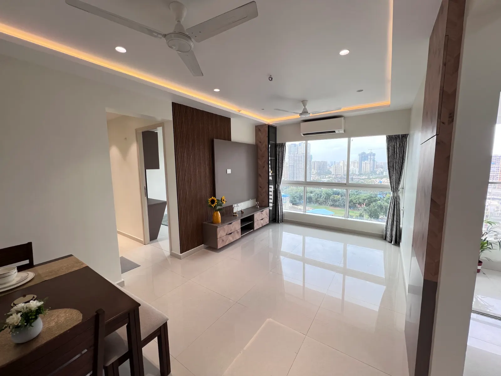 Living and dining area at Bhavya Elite